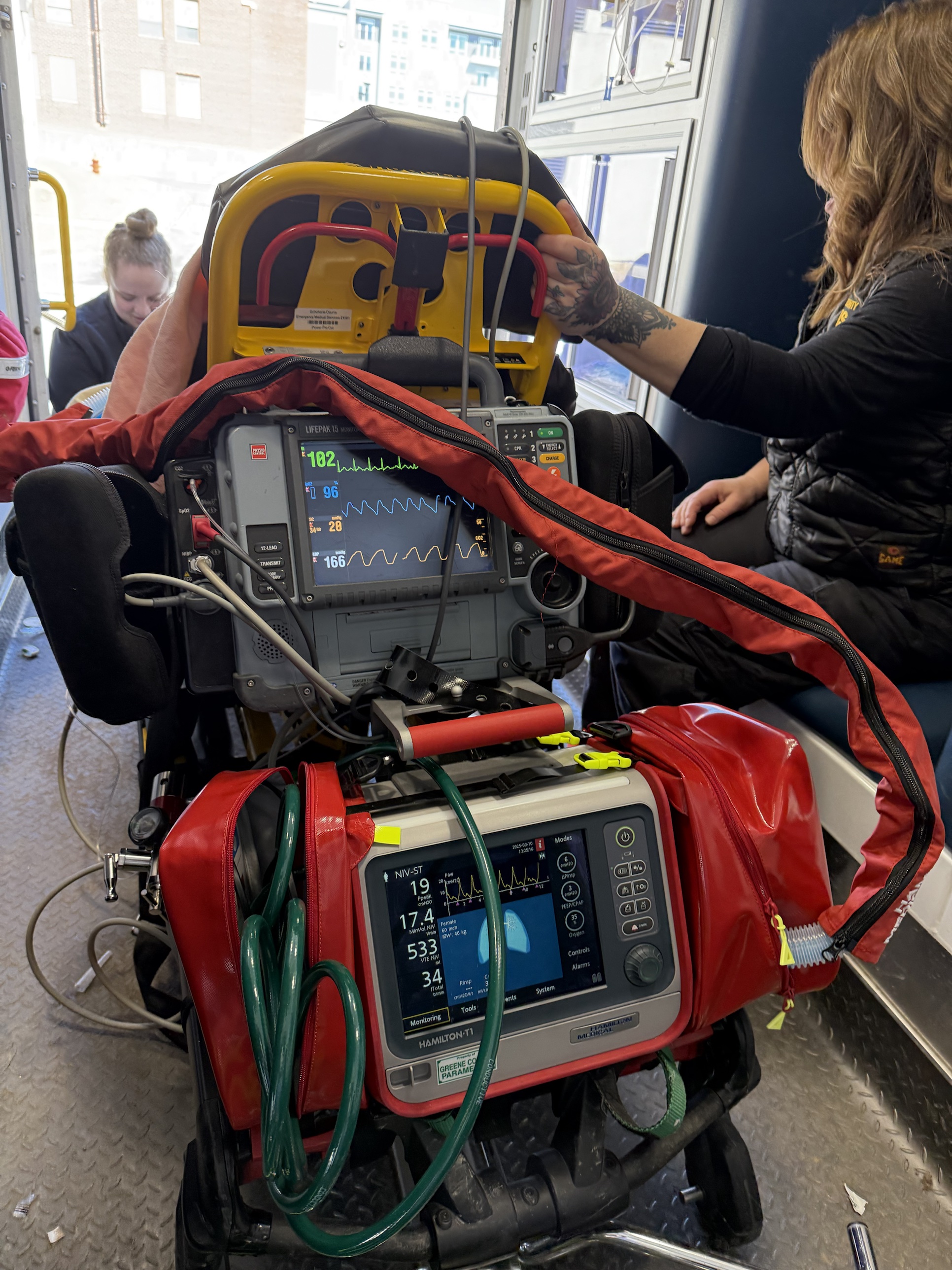 Hamilton T1 ventilator and LIFEPAK monitor on a stretcher during transport