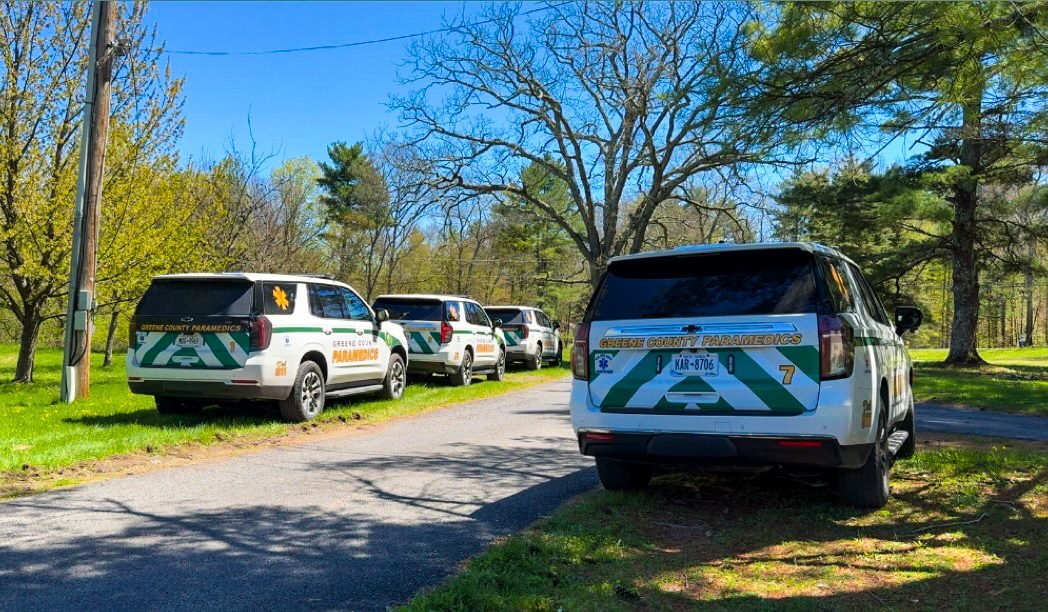 Four GCEMS fly cars parked along a country road