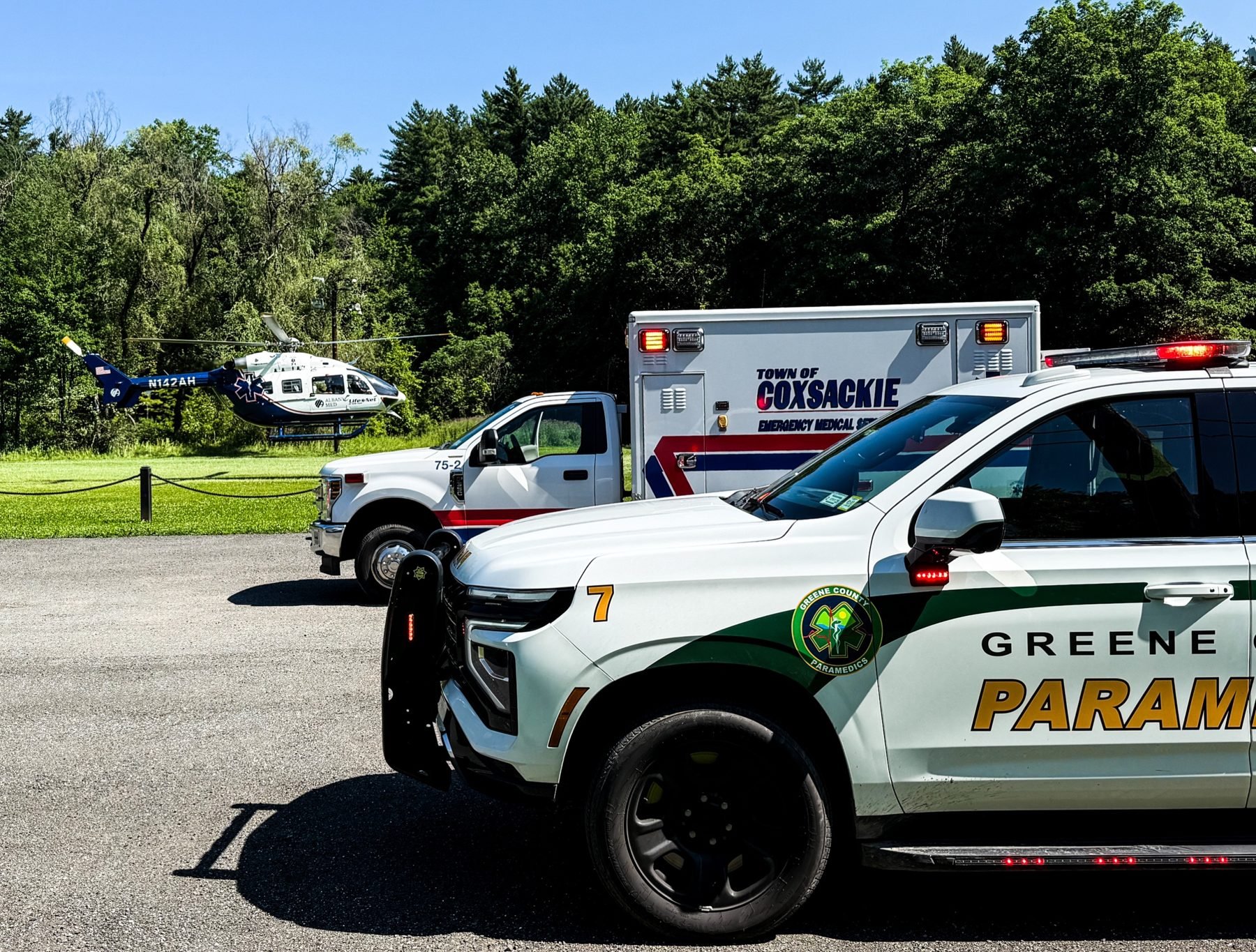 Medic 7 on scene with Town of Coxsackie EMS ambulance and an Albany Med LifeNet helicopter landing